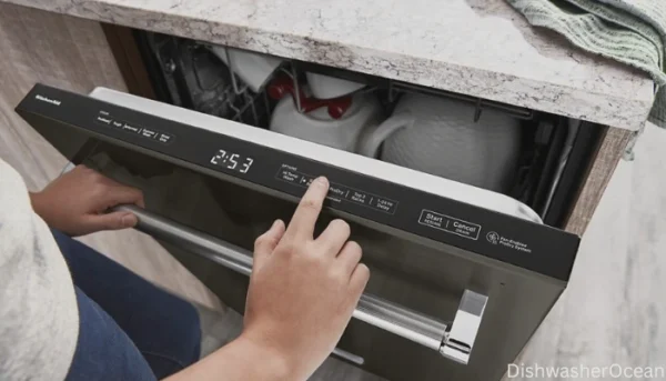 A man trying to initiate diagnostics on his Kitchen Dishwasher.